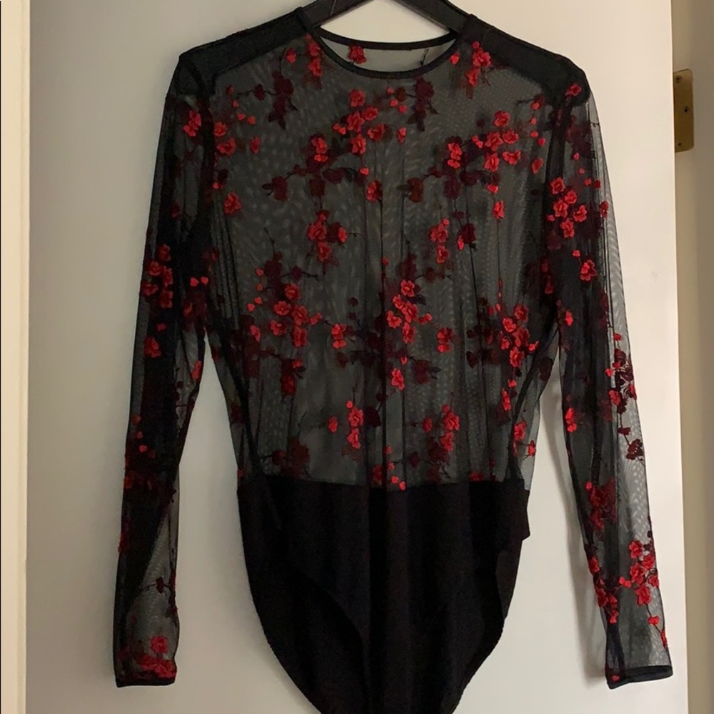 Designer see thru body suit